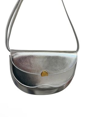 Oleada limited edition “from boardroom to ballroom” echo bag Maye Musk silver